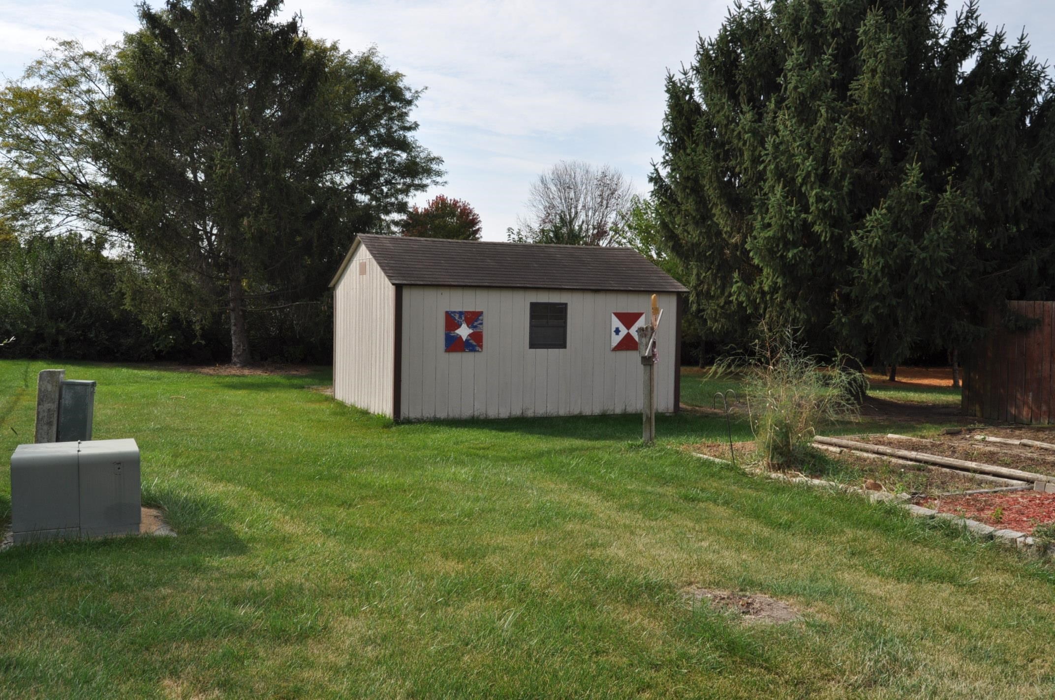 135 Fieldcrest Lane Cedarville, IL 61013 - Photo 44 of 45 a backyard of a house with trampoline