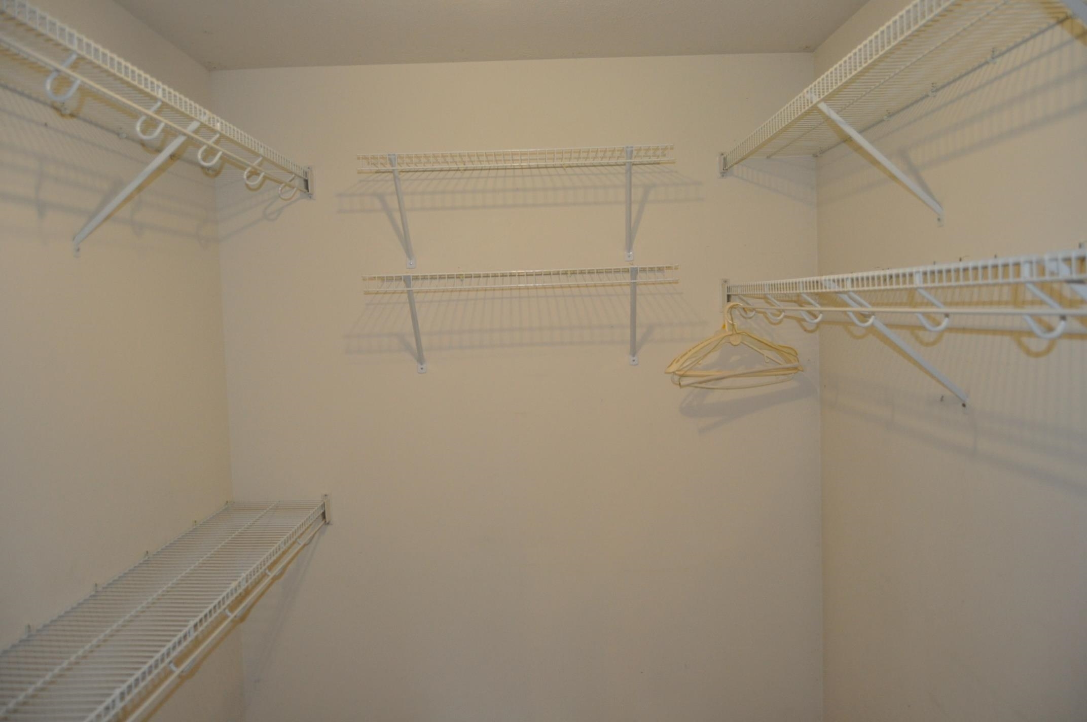 135 Fieldcrest Lane Cedarville, IL 61013 - Photo 9 of 45 a view of a room with racks on the wall
