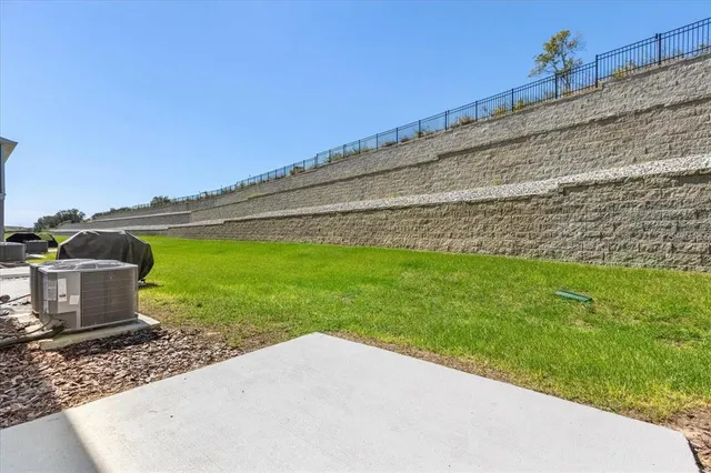 a house view with a seating space and garden space