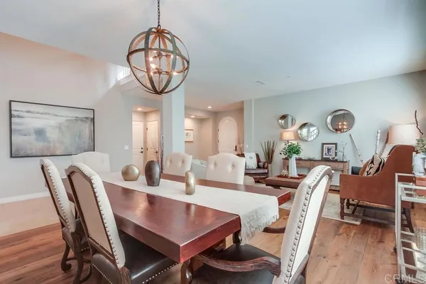 a kitchen with stainless steel appliances granite countertop a stove a refrigerator and a sink