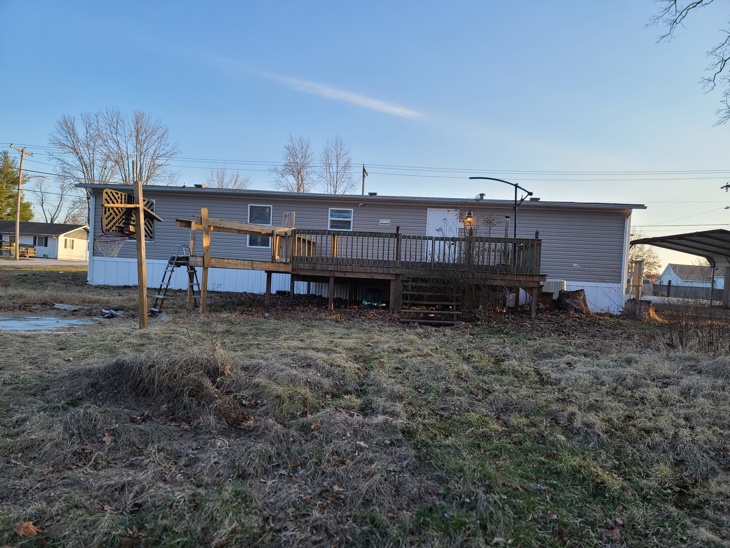 303 Seba Street Hurst, IL 62949 - Photo 13 of 13 a view of a house with a yard and sitting area