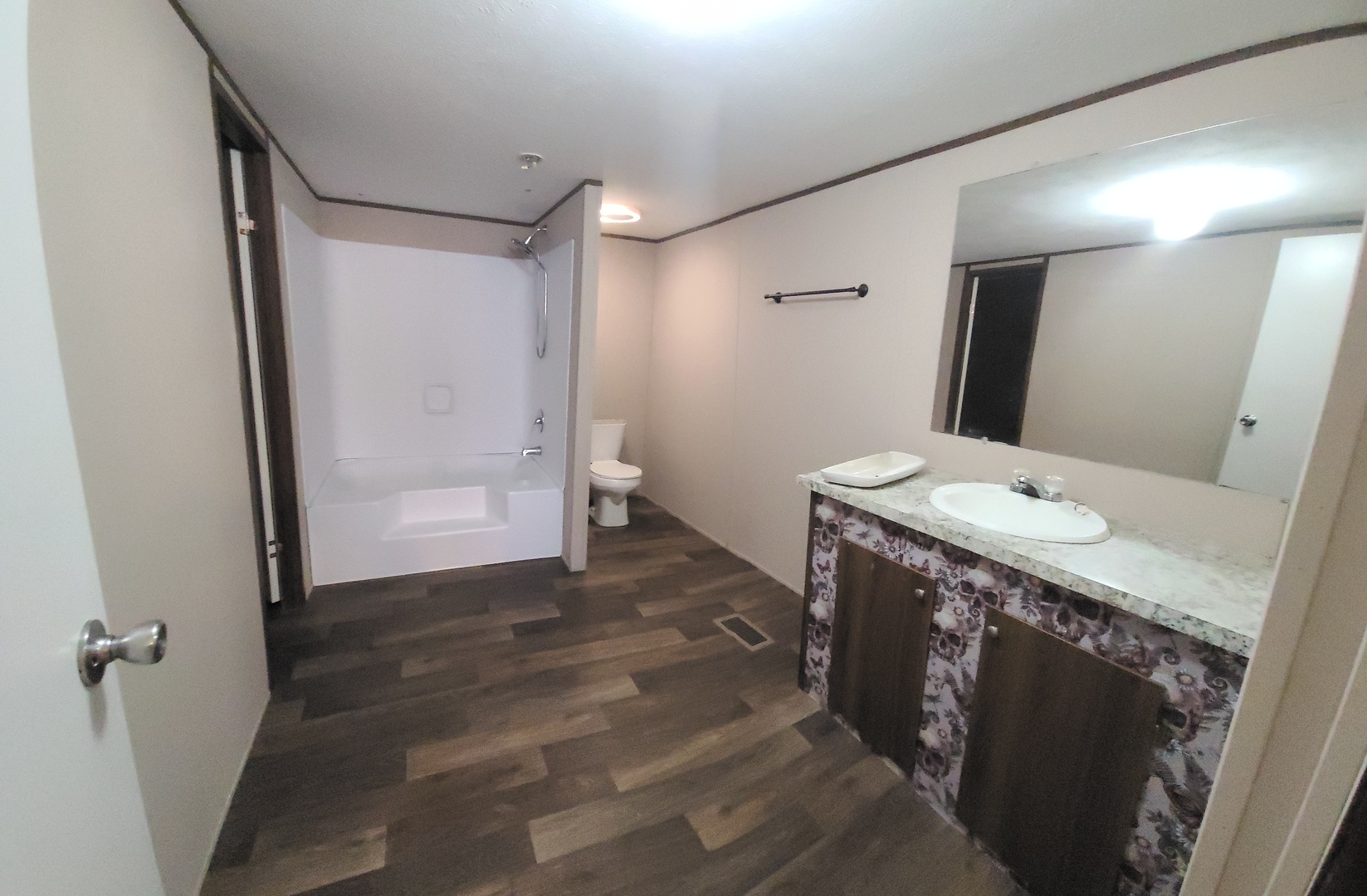 303 Seba Street Hurst, IL 62949 - Photo 10 of 13 a bathroom with a sink and a mirror