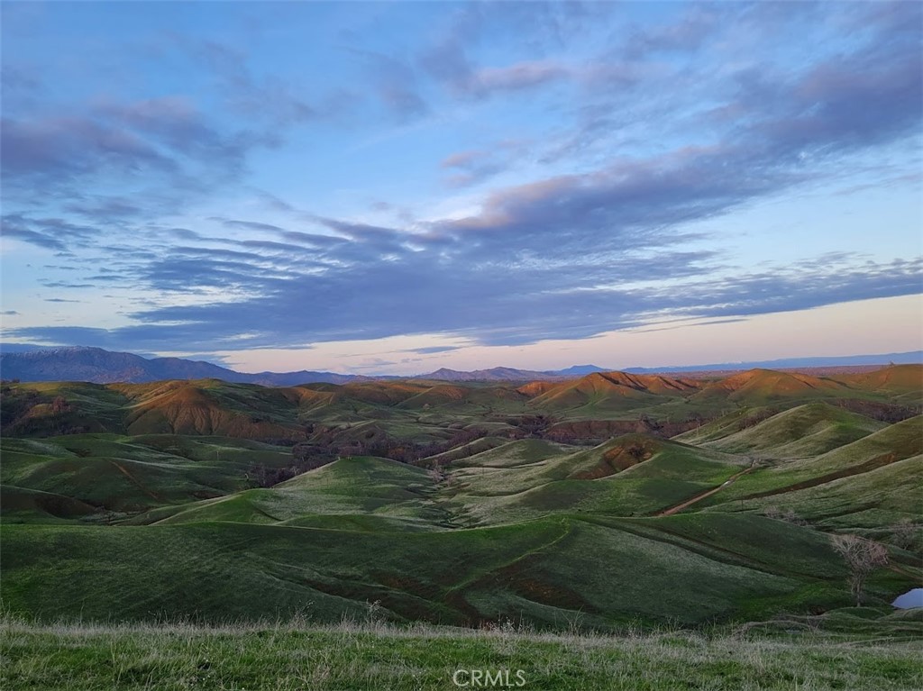 0 Mcauliffe Road Cottonwood, CA 96022 - Photo 56 of 59 a view of a lush green hillside and a houses