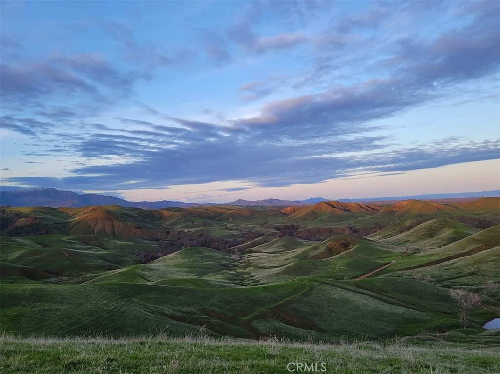 0 Mcauliffe Road Cottonwood, CA 96022 - Photo 59 of 59 a view of a lush green hillside and a houses