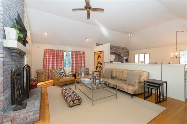 30 Cherry Brook Road Weston, MA 02493 - Photo 4 of 30 a living room with furniture and a fireplace