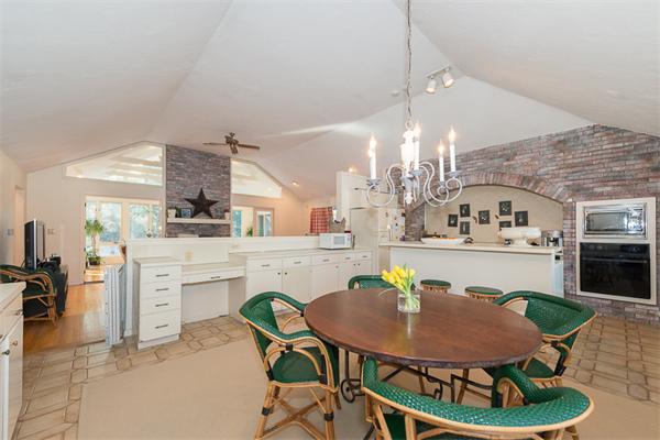30 Cherry Brook Road Weston, MA 02493 - Photo 6 of 30 a swimming pool with a table and chairs