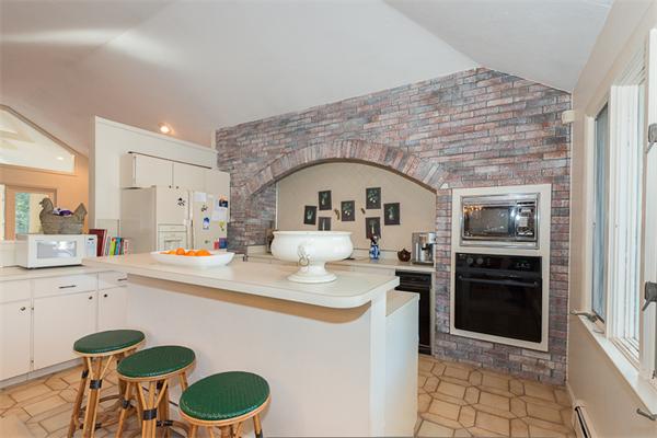 30 Cherry Brook Road Weston, MA 02493 - Photo 7 of 30 a kitchen with a sink a stove and refrigerator