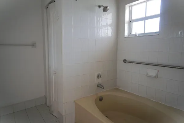 a bathroom with a bathtub