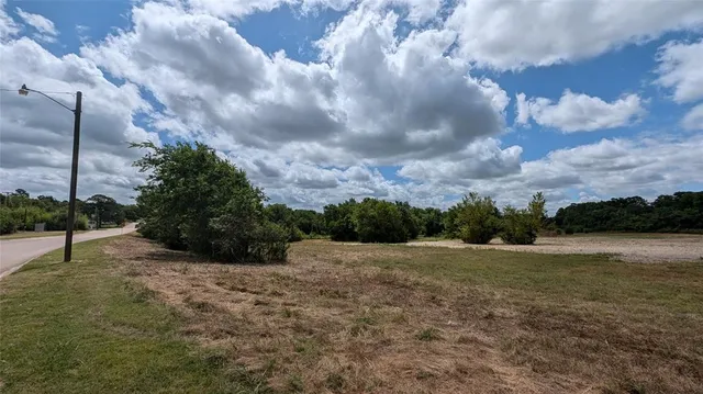 a view of an outdoor space with a lake view