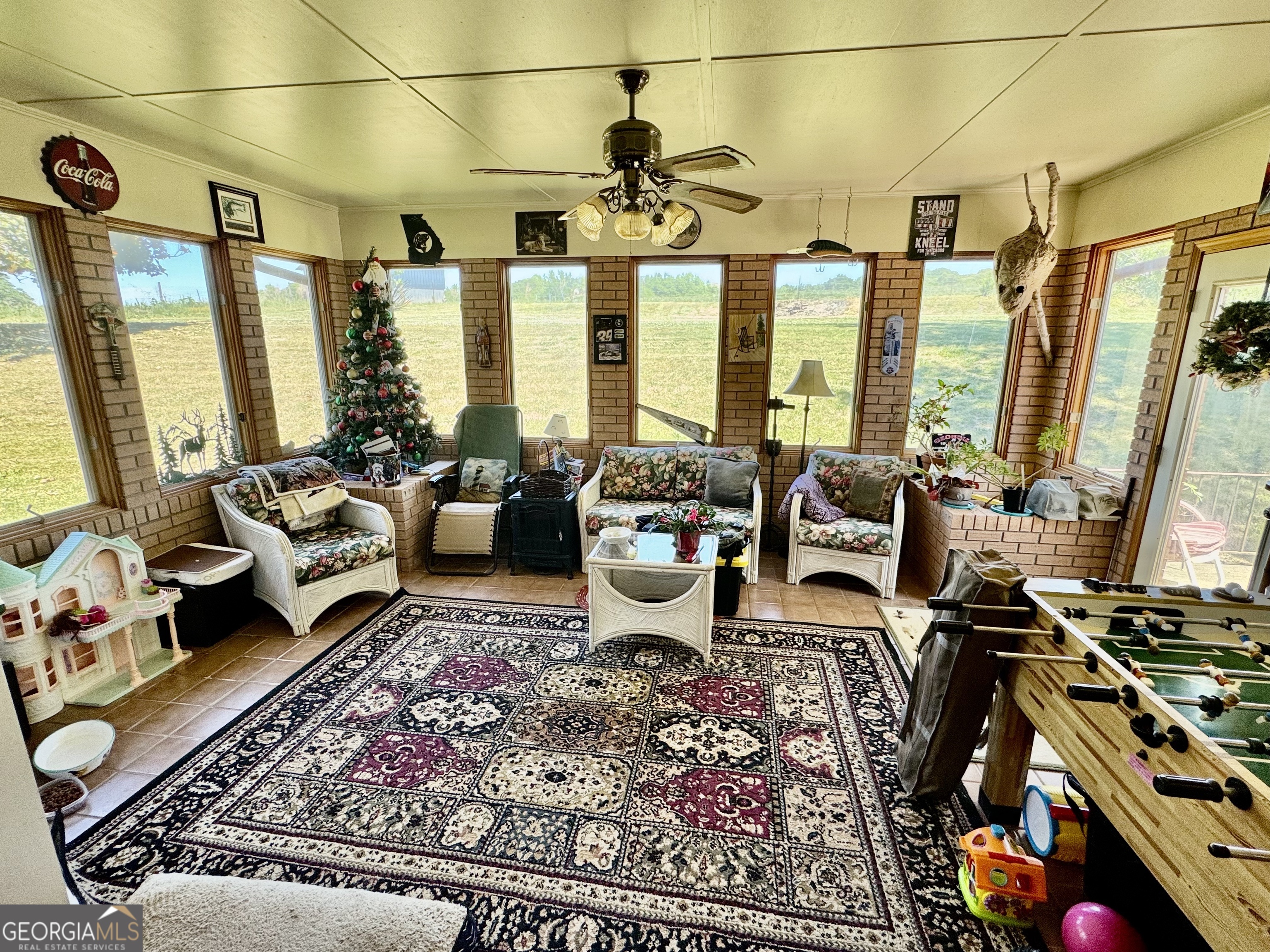 1530 Lankford Road Bowersville, GA 30516 - Photo 7 of 14 a living room with furniture and large windows