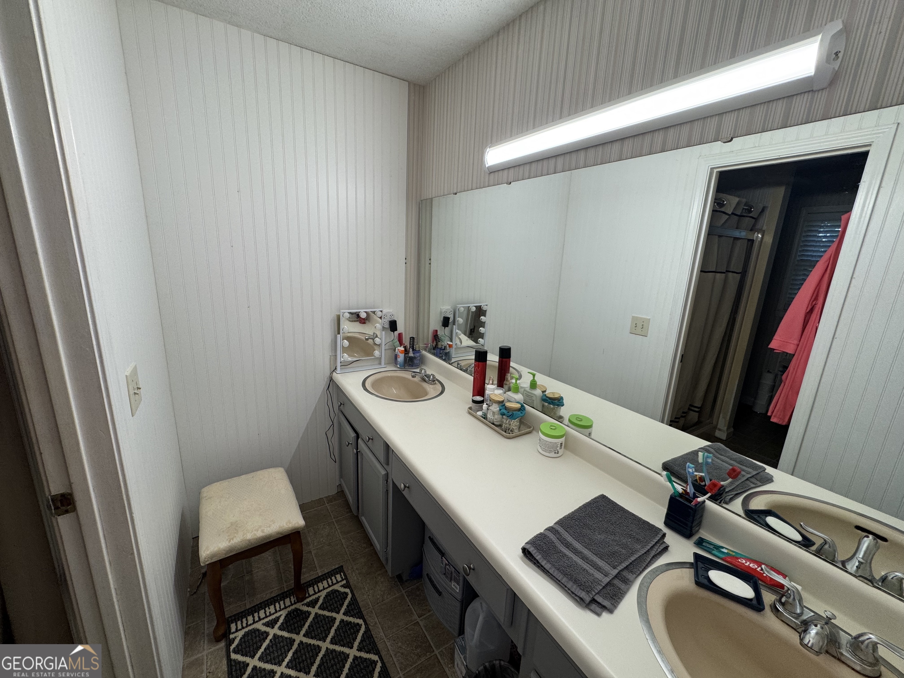 1530 Lankford Road Bowersville, GA 30516 - Photo 10 of 14 a bathroom with a sink toilet and a mirror