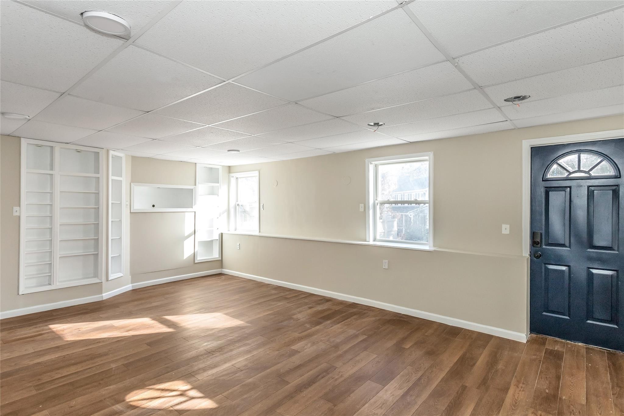 9 Bayberry Road Wading River, NY 11792 - Photo 13 of 17 Entrance foyer with a drop ceiling and wood-type flooring