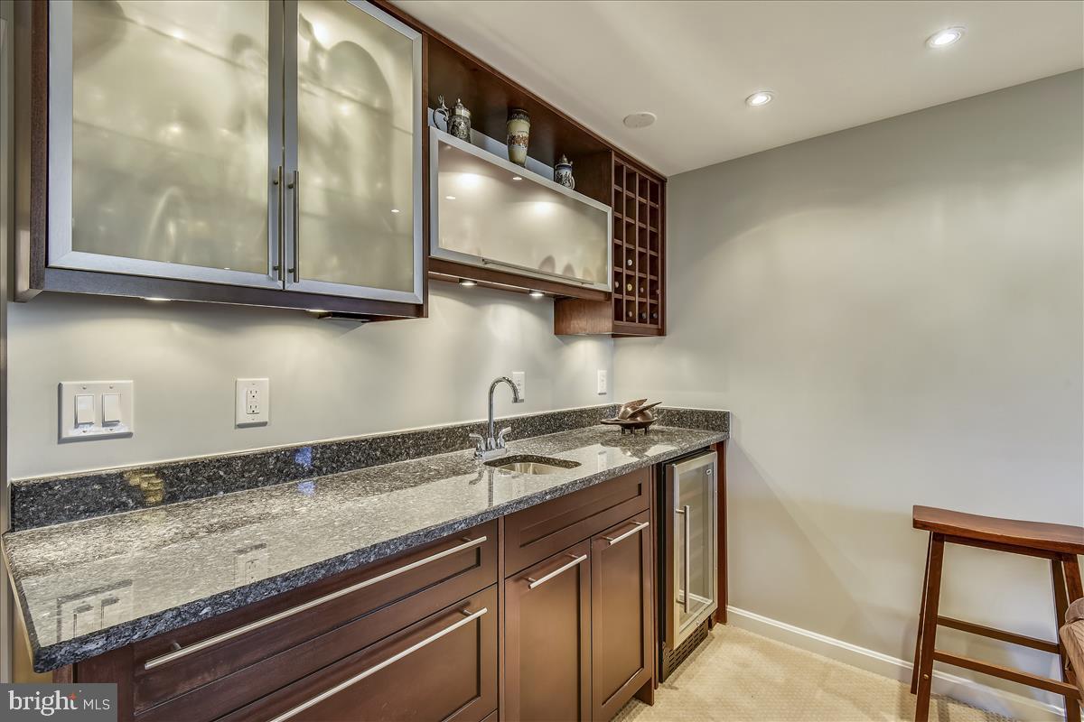 1944 Foxhall Road McLean, VA 22101 - Photo 26 of 39 Lower level wet bar with granite counters