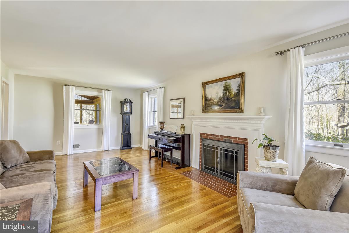 1944 Foxhall Road McLean, VA 22101 - Photo 6 of 39 Living room full of light and hardwood floors