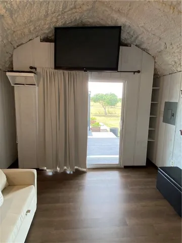 a view of outdoor space and wooden floor