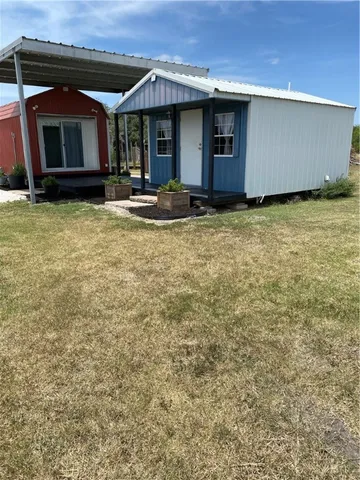 a house view with a outdoor space