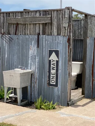 a front view of a house with parking area