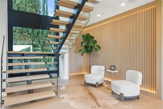 a large white kitchen with a large window