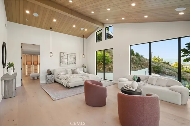 a bathroom with a tub and a shower
