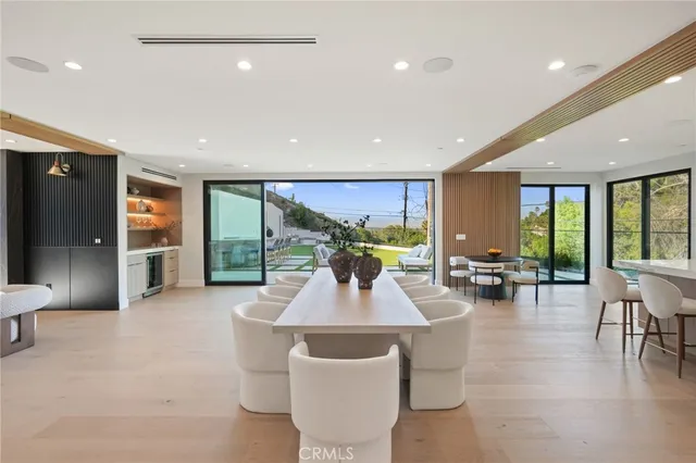 a view of a patio with swimming pool table and chairs