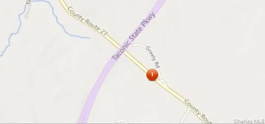 a view of a forest with lots of trees