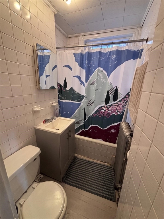 85 Phillips Street, Unit 7 Boston, MA 02114 - Photo 5 of 5 a bathroom with a toilet and a sink