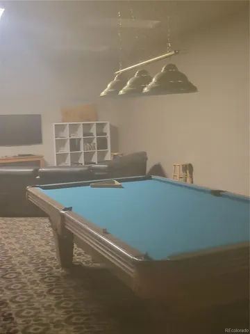 a view of wooden floor and cabinet