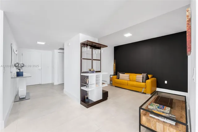 a living room with furniture and a couch