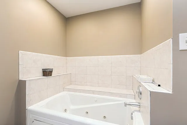 a bathroom with a bathtub