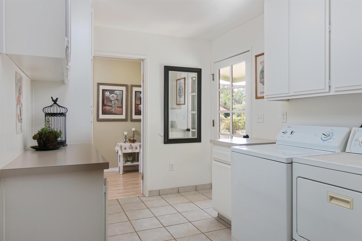 750 South Rice Road Ojai, CA 93023 - Photo 19 of 27 a kitchen with a sink and cabinets
