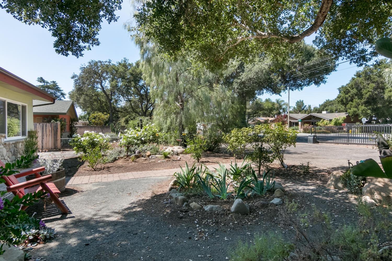 750 South Rice Road Ojai, CA 93023 - Photo 2 of 27 a view of a bench in a backyard of a house