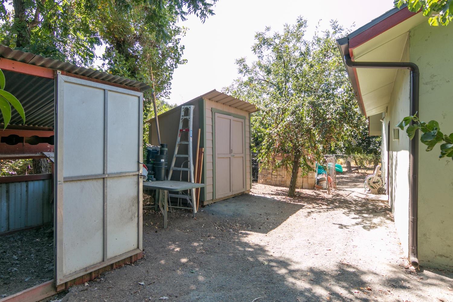 750 South Rice Road Ojai, CA 93023 - Photo 27 of 27 a backyard of a house with barbeque oven and outdoor seating