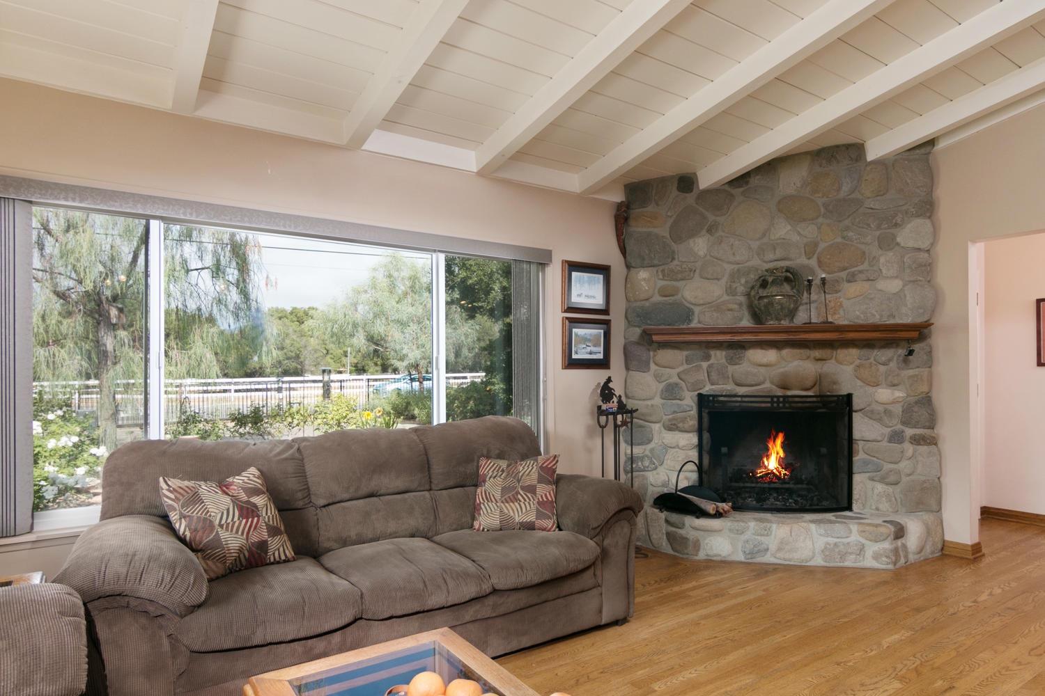 750 South Rice Road Ojai, CA 93023 - Photo 3 of 27 a living room with furniture and a fireplace