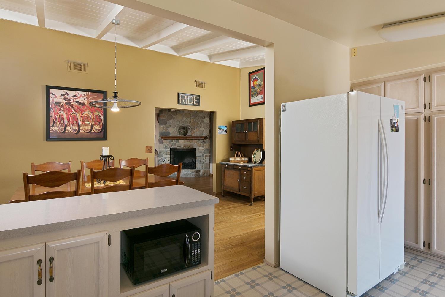 750 South Rice Road Ojai, CA 93023 - Photo 10 of 27 a kitchen with stainless steel appliances a stove refrigerator and a sink