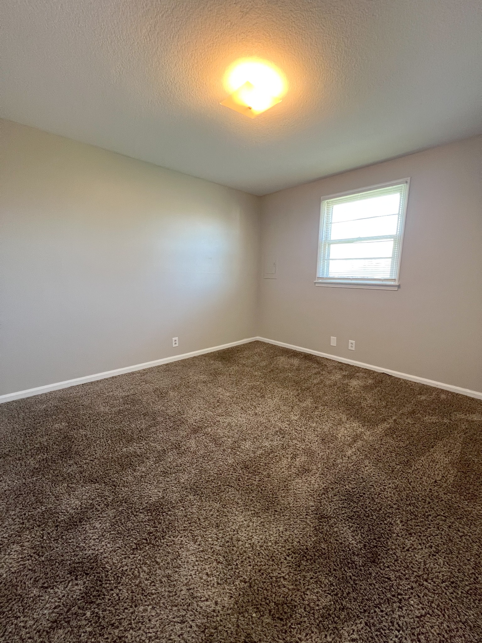 135 Airport Road, Unit C Clarksville, TN 37042 - Photo 11 of 16 an empty room with a window