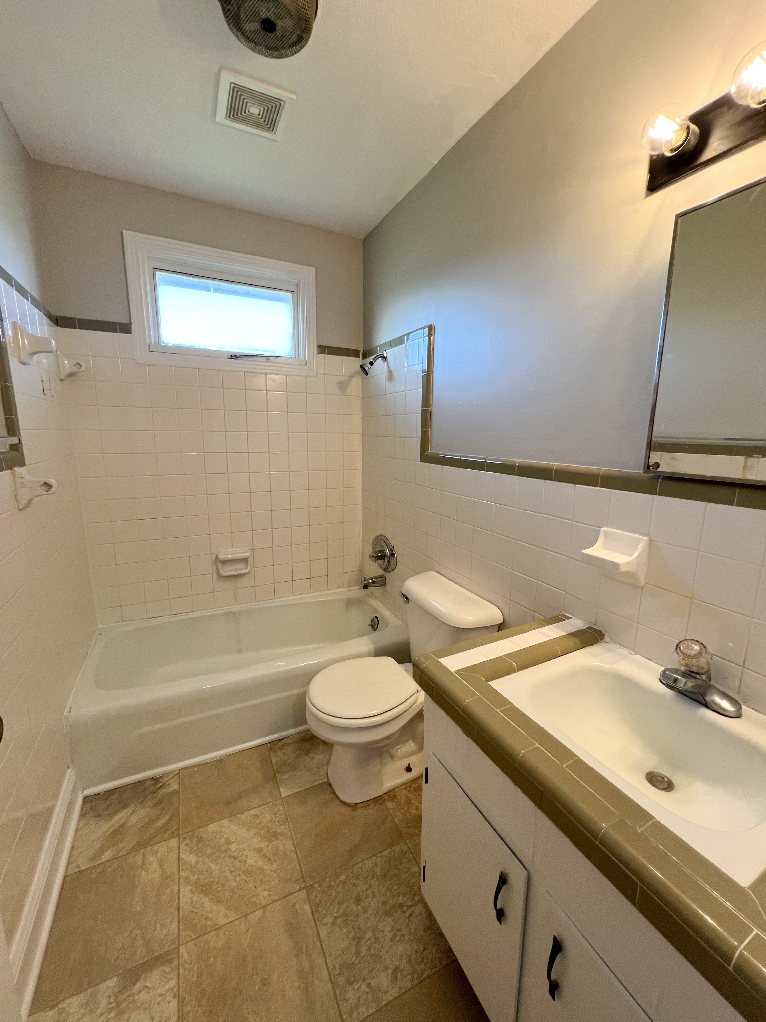 135 Airport Road, Unit C Clarksville, TN 37042 - Photo 12 of 16 a bathroom with a sink a toilet and shower