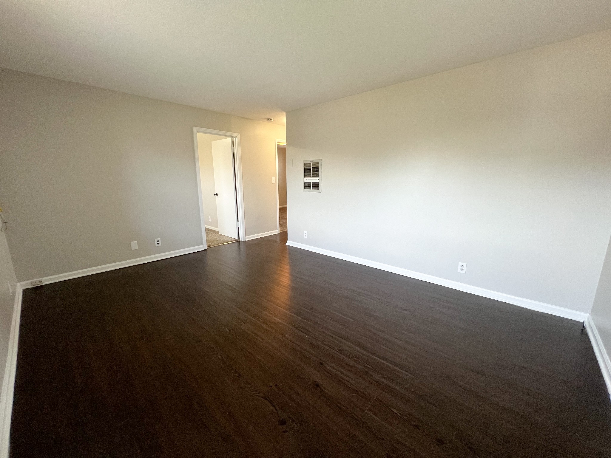 135 Airport Road, Unit C Clarksville, TN 37042 - Photo 3 of 16 a view of an empty room and wooden floor
