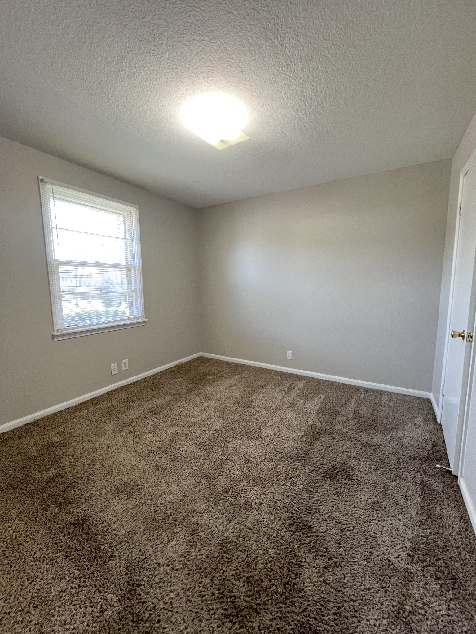 135 Airport Road, Unit C Clarksville, TN 37042 - Photo 9 of 16 an empty room with a window