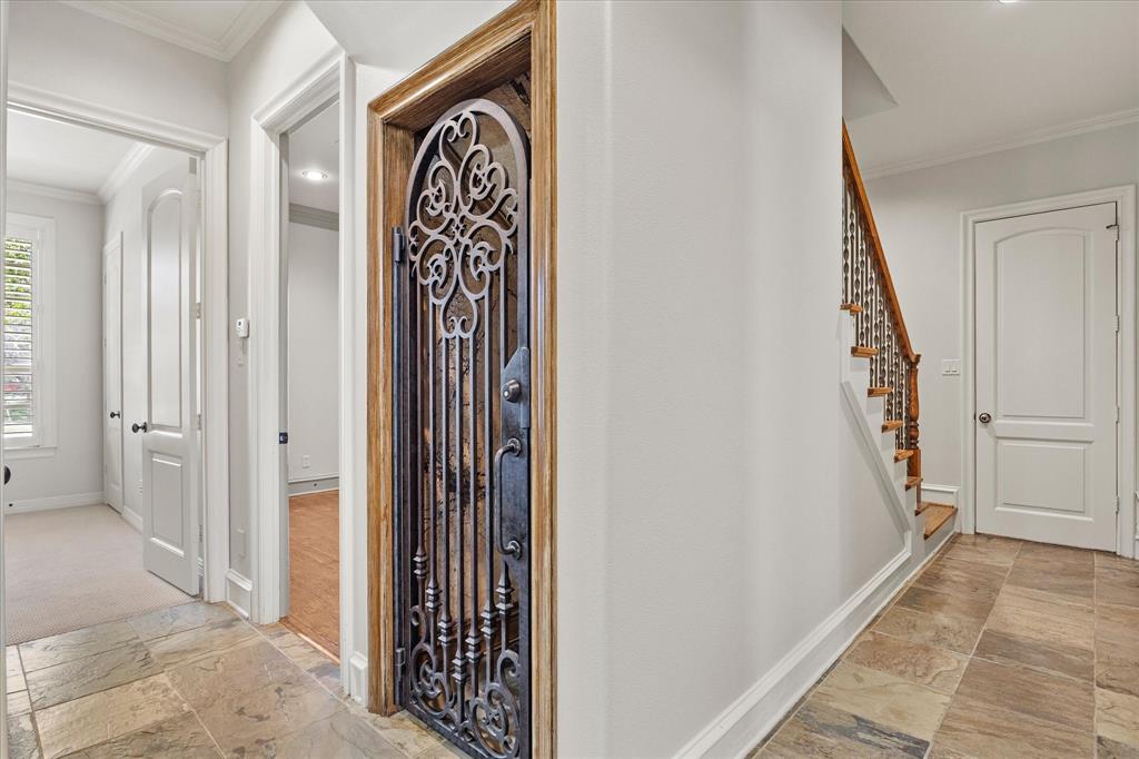 161 Ridgemont Road Heath, TX 75126 - Photo 20 of 40 a view of an entryway with hallway
