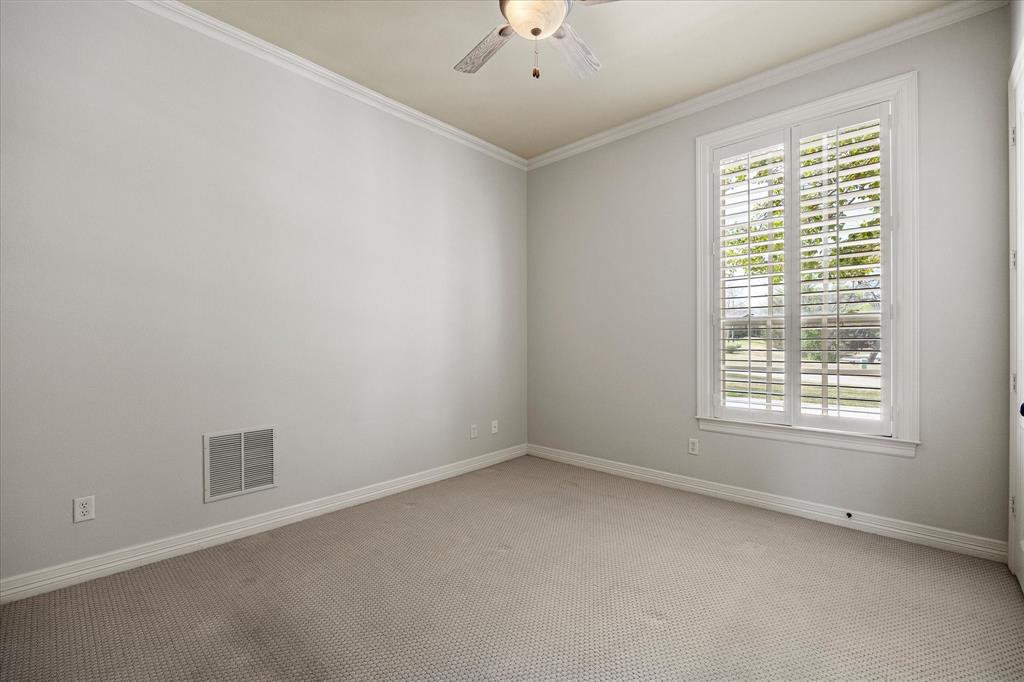 161 Ridgemont Road Heath, TX 75126 - Photo 22 of 40 an empty room with a window