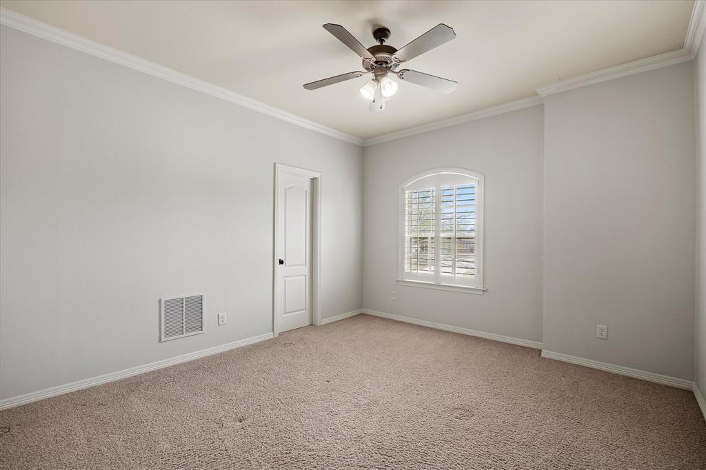 161 Ridgemont Road Heath, TX 75126 - Photo 28 of 40 a view of an empty room with a window