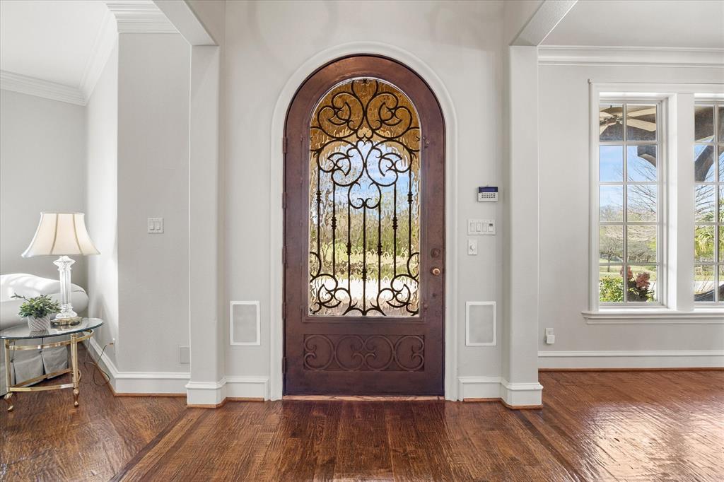 161 Ridgemont Road Heath, TX 75126 - Photo 4 of 40 a view of an entryway with wooden floor