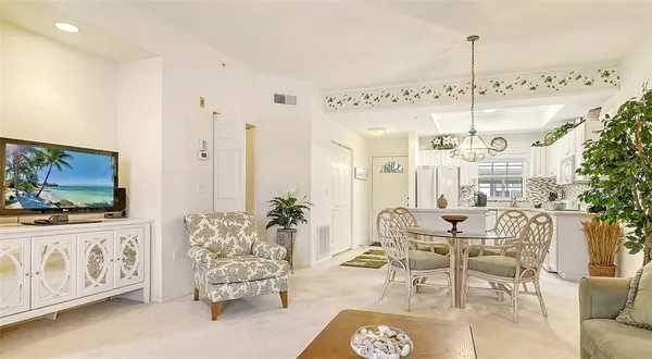 a bedroom with a bed and a lamp on table