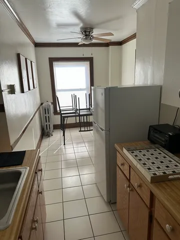 a living room with a couch and a table