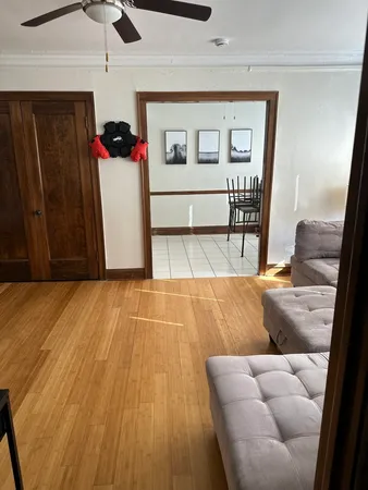 a bathroom with a sink a toilet a mirror and bathtub