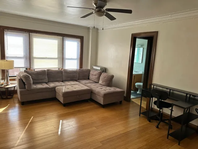 a kitchen with a sink and a stove top oven