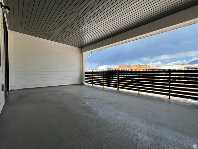717 West W Coho Lane South, Unit 2F302 Midvale, UT 84047 - Photo 10 of 22 Spacious covered patio with concrete flooring