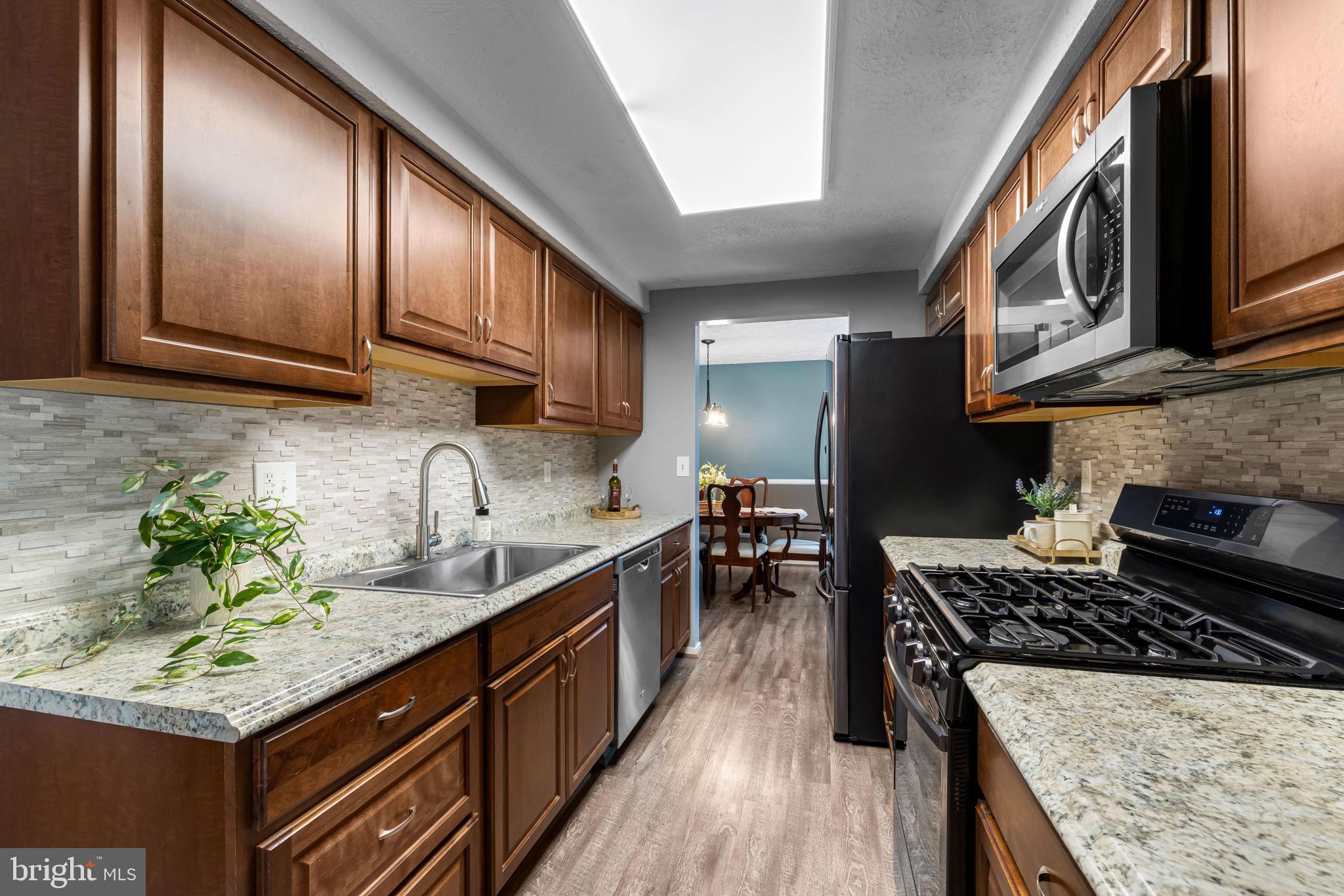 8418 Tachbrook Road Nottingham, MD 21236 - Photo 6 of 23 Updated kitchen has granite counters-SS appliances