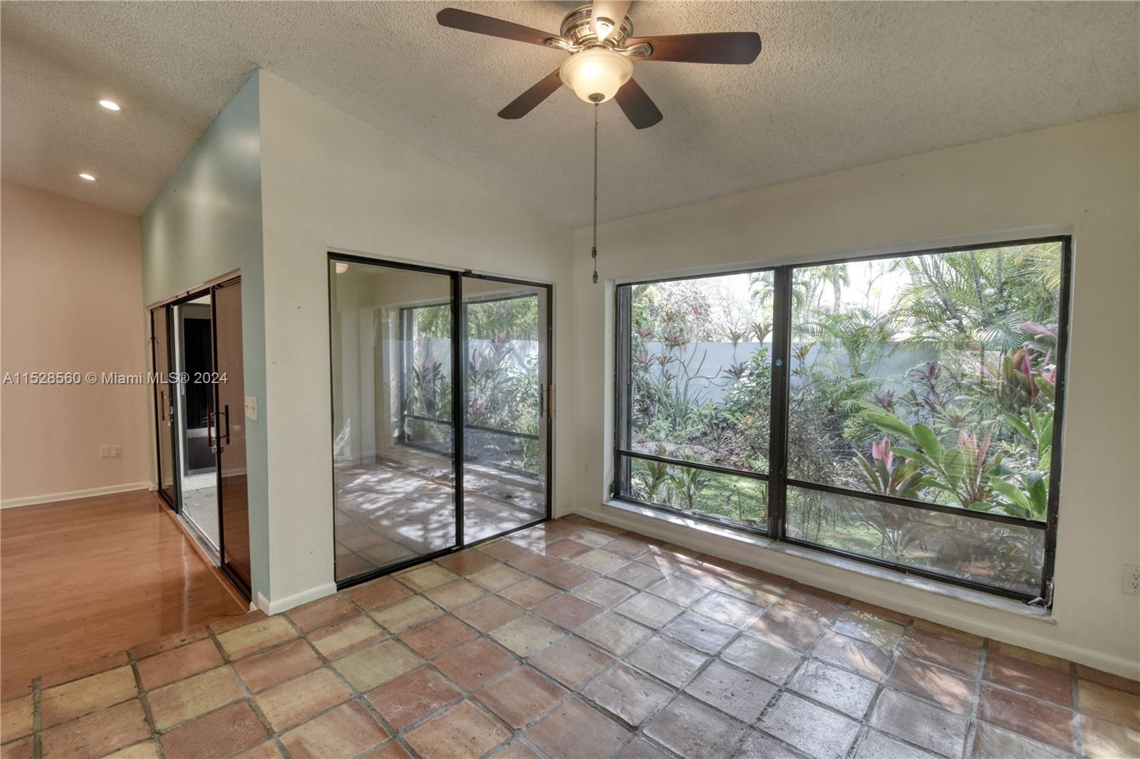 Kendall Miami, FL 33173 - Photo 8 of 8 a view of empty room with wooden floor and fan