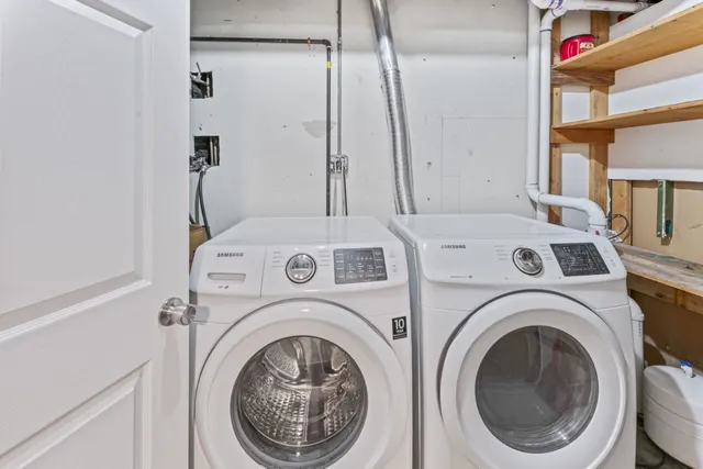a view of a patio with couches table and chairs and potted plants